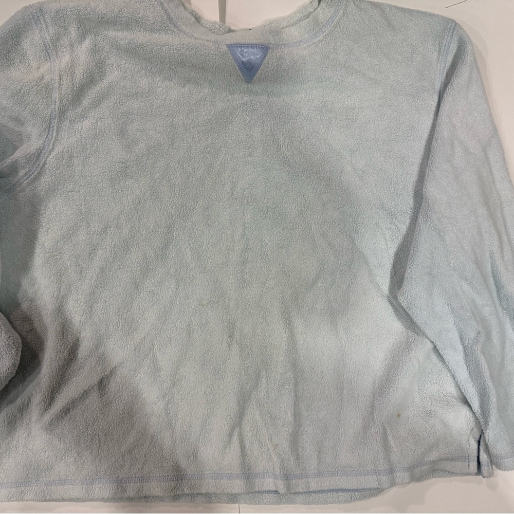 Baby blue Karen Scott sports sweater